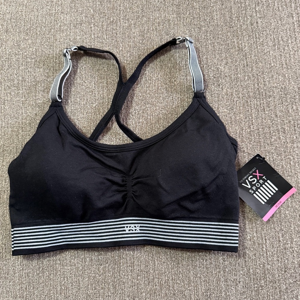 NWT Victoria’s Secret Sport seamless racerback sports bra in black.